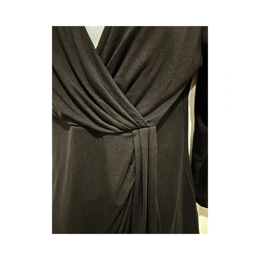 White House Black Market 3/4 length sleeve V-neck black top. Size small.
